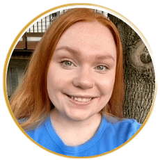 Female with long red hair and green eyes